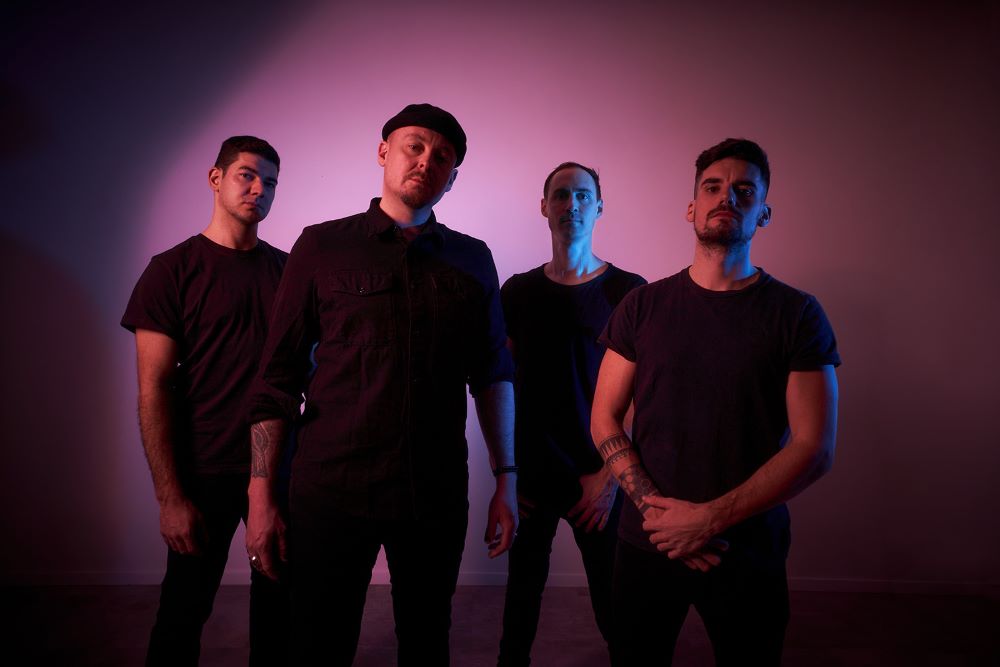 Metalcore Newcomer IMMUNITY mit Video Premiere zu “Of War And Peace (feat. Parallyx)” – Neues Album “Dark Side of the Earth” am 01. November 2024